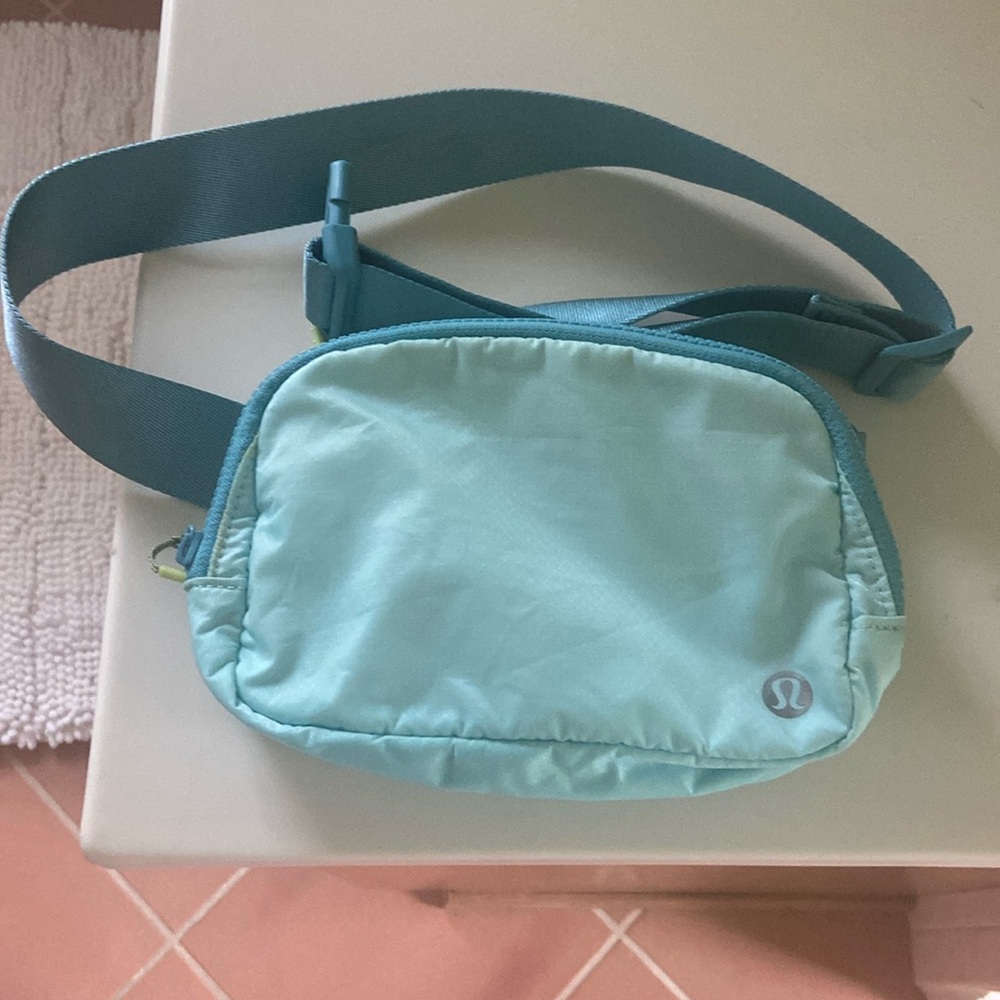 Belt bag turquoise back zipper adjustable strap